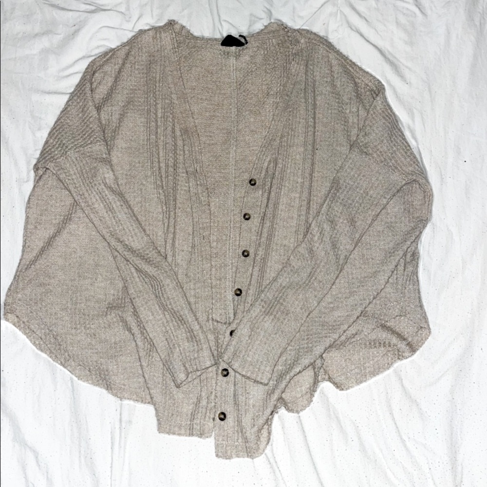 Light tan button up cardigan sweater